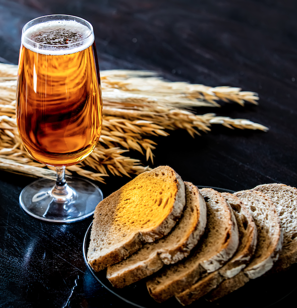 pão, trigo e vinho para representar a Adélia Boulangerie