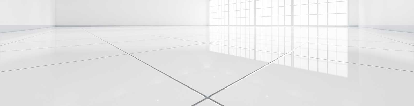 piso branco e quadriculado de um ambiente após a limpeza profissional de pisos